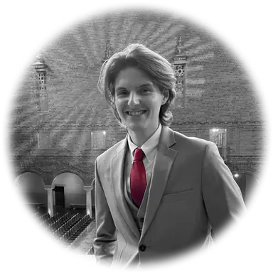 Portrait of me in a grey suit and burgundy tie